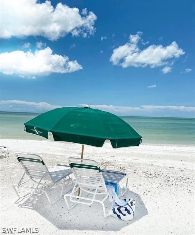 water view featuring a beach view