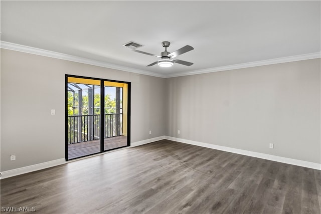 empty room with hardwood / wood-style flooring, ornamental molding, and ceiling fan