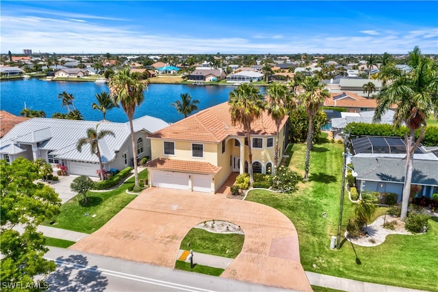 drone / aerial view with a water view