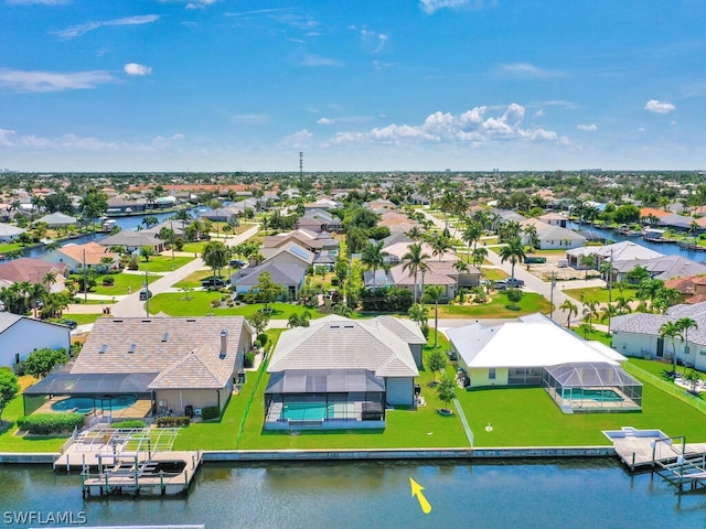 drone / aerial view featuring a water view