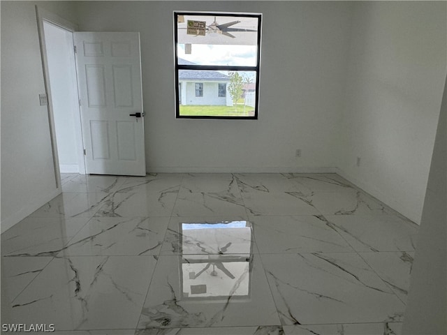 empty room featuring tile flooring