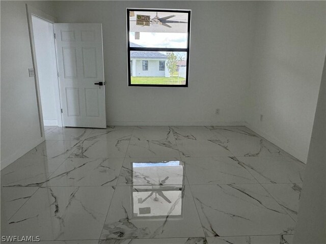 empty room with marble finish floor