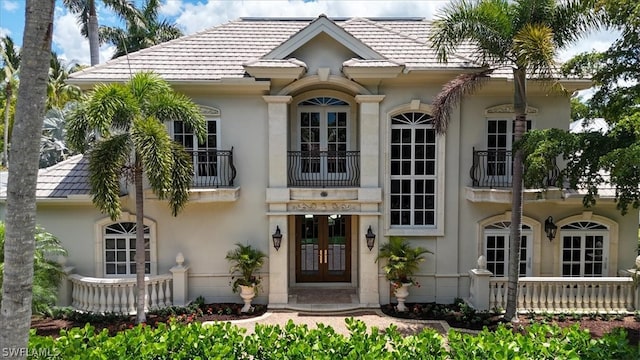 doorway to property with french doors and a balcony