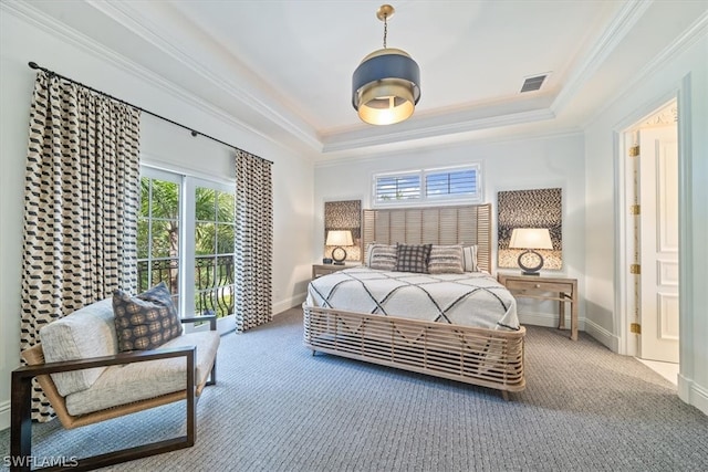 carpeted bedroom featuring crown molding, access to exterior, and a tray ceiling