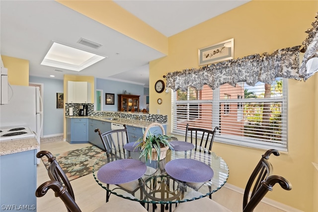 dining area featuring sink