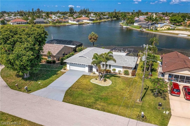 bird's eye view with a water view