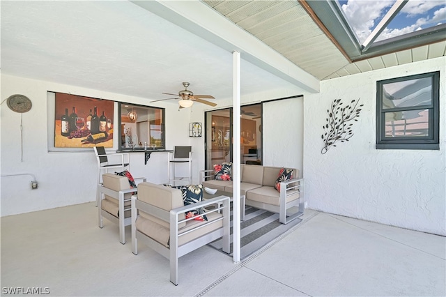 view of patio with ceiling fan