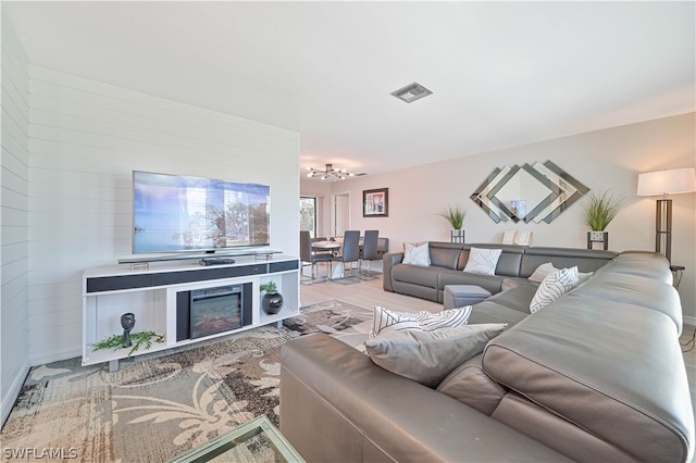 living room with light hardwood / wood-style flooring