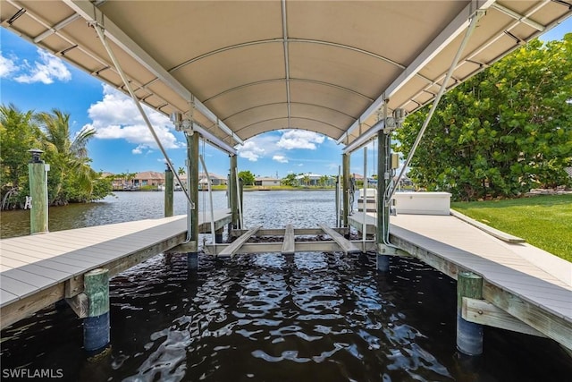 dock area with a water view