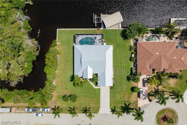 drone / aerial view with a water view