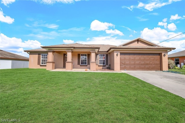 view of front facade featuring a garage and a front lawn