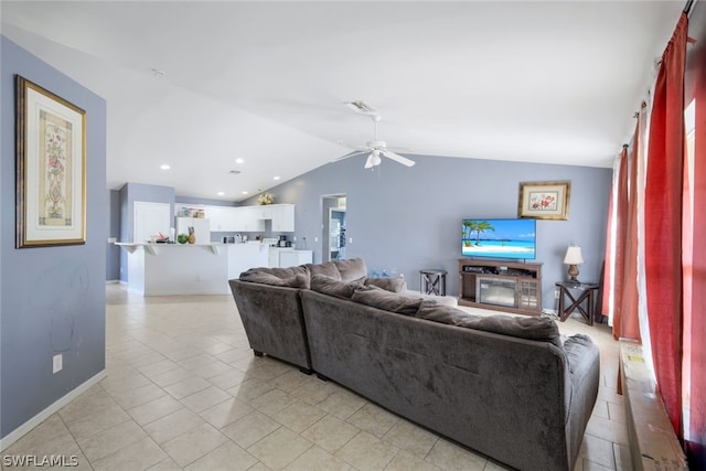 tiled living room with vaulted ceiling and ceiling fan