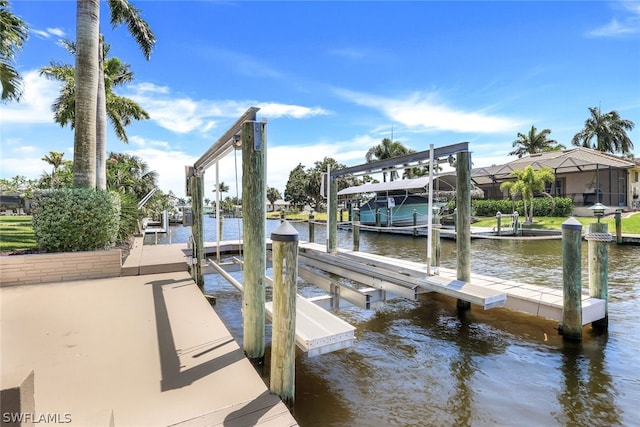 dock area featuring a water view