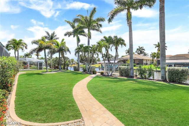 view of nearby features with a yard and a water view