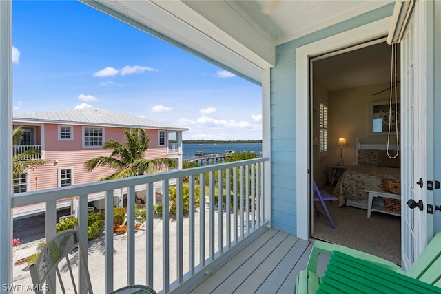 balcony featuring a water view