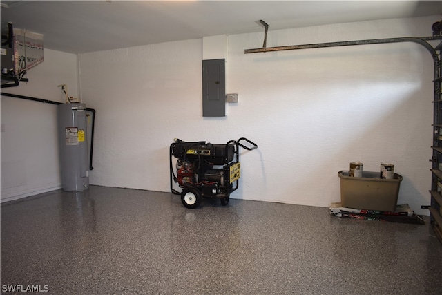 garage featuring water heater and electric panel