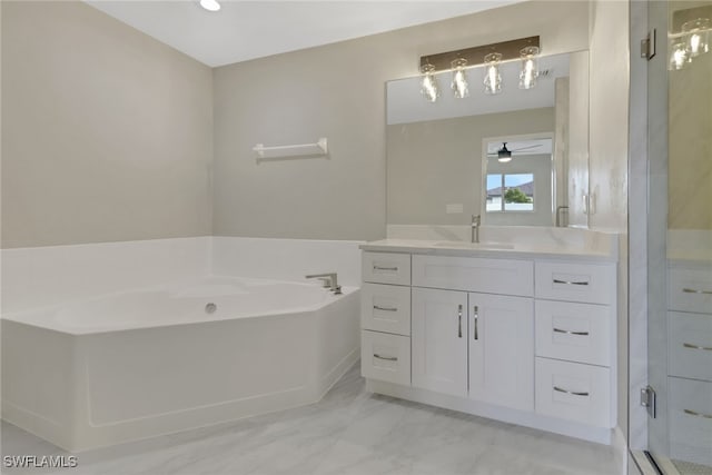 bathroom with vanity, ceiling fan, and independent shower and bath