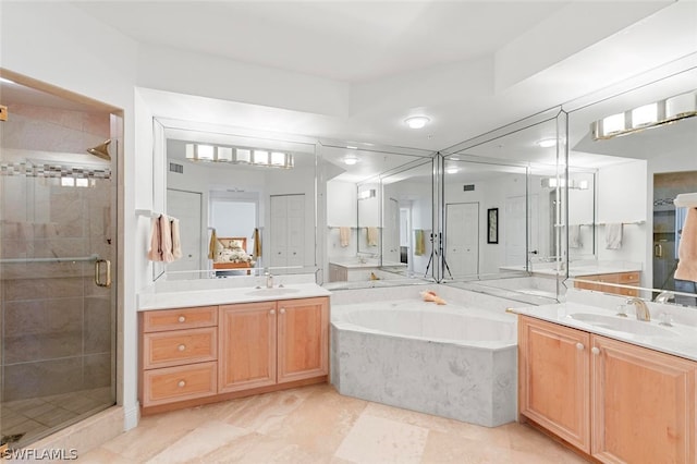 bathroom with vanity, tile floors, and separate shower and tub