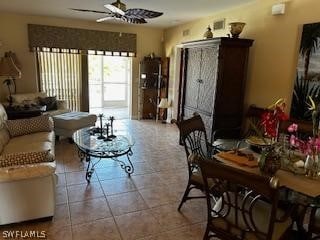 interior space featuring ceiling fan