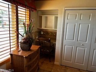 interior space with tile patterned flooring