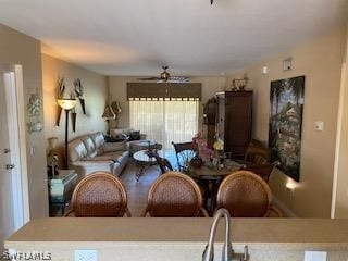 living room featuring ceiling fan