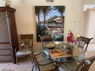 view of tiled dining space