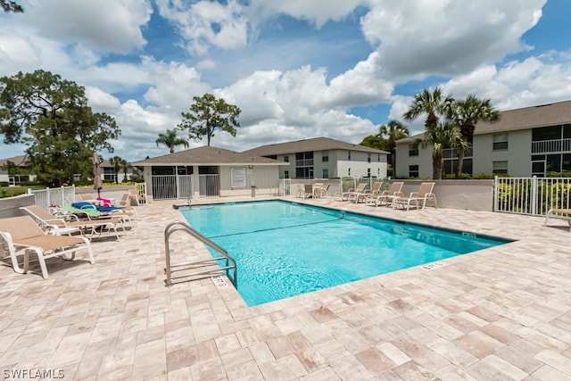 view of swimming pool featuring a patio