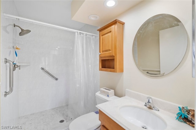 bathroom with vanity, toilet, and a shower with shower curtain