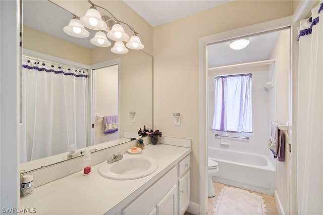 bathroom with vanity, toilet, and tile patterned flooring