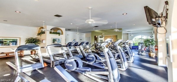 workout area with ceiling fan