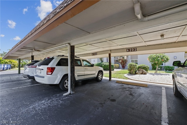 view of parking featuring a carport