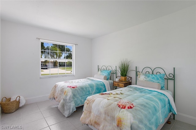 bedroom featuring tile flooring