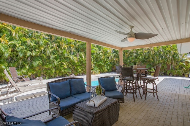 view of patio / terrace featuring ceiling fan