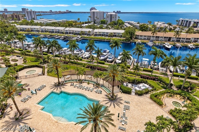 view of swimming pool with a water view