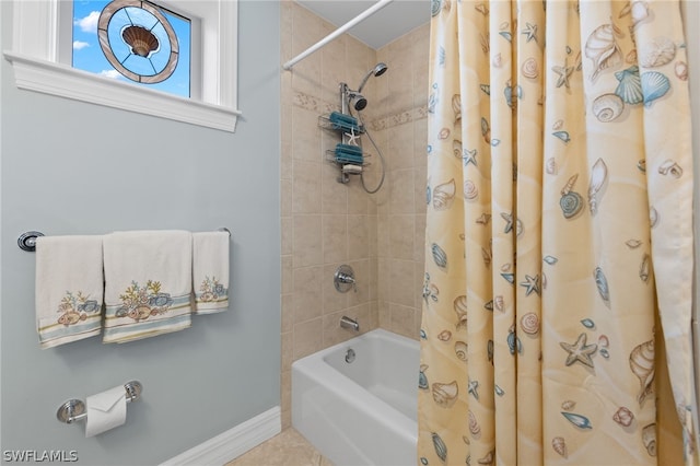 bathroom with shower / bath combo