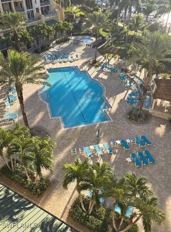 view of swimming pool with a patio