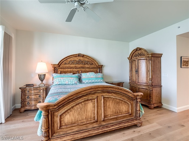 bedroom featuring ceiling fan and light hardwood / wood-style floors