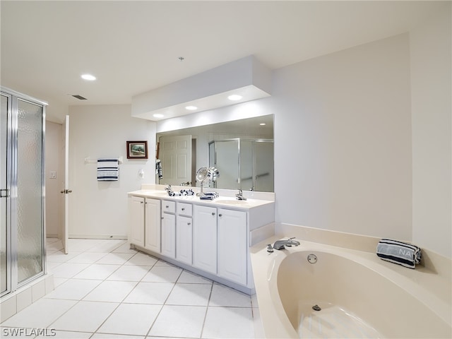 bathroom with vanity, independent shower and bath, and tile patterned floors