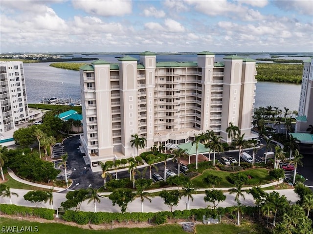 view of building exterior featuring a water view