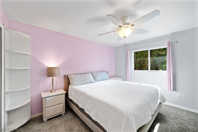 bedroom featuring light colored carpet and ceiling fan