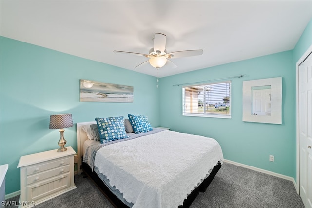 carpeted bedroom with a closet and ceiling fan