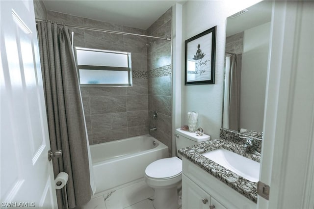 full bathroom featuring vanity, toilet, and shower / bath combination with curtain