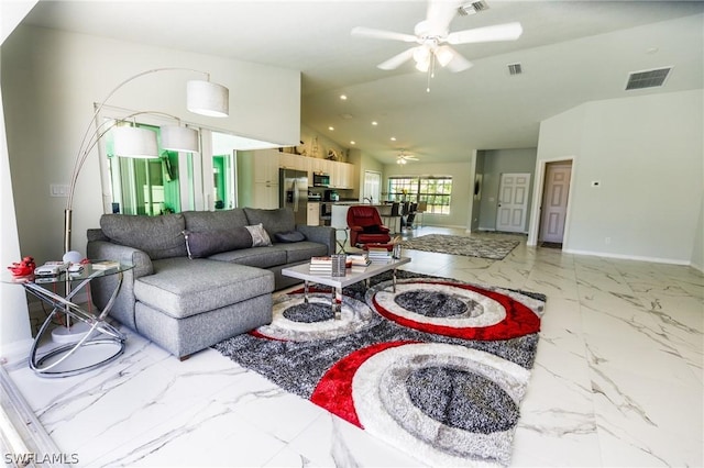 living room with lofted ceiling and ceiling fan