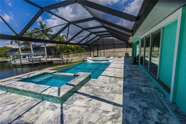 view of pool with a patio, an in ground hot tub, a water view, and a lanai