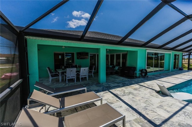 exterior space featuring a patio area and a lanai