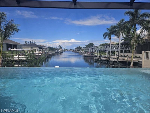 view of dock with a water view