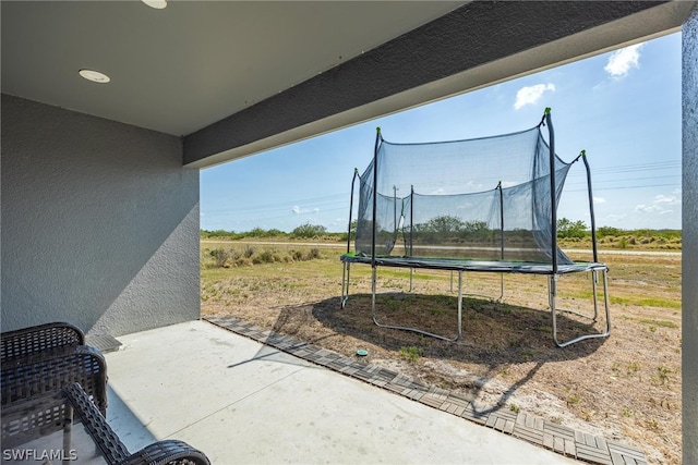 exterior space featuring a trampoline