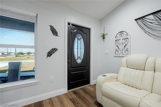 entryway with dark wood-type flooring