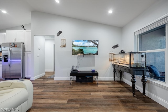 interior space with lofted ceiling and dark hardwood / wood-style floors