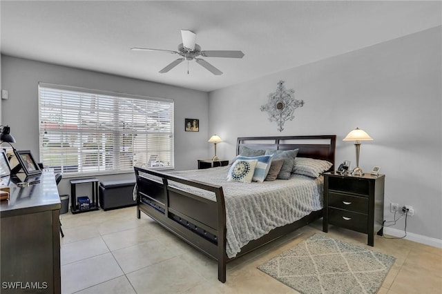 tiled bedroom with ceiling fan